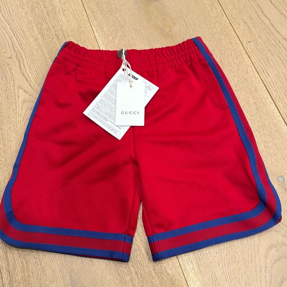 Red Gucci shorts with blue detail on sides